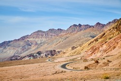 Death Valley winding road through colorful mountains