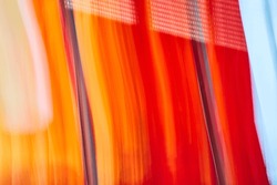 Streaks of fiery colors in abstract light and color art