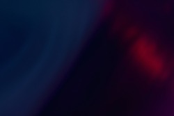 Lens flare overlay. Blur neon rays. Bokeh light leak texture. Defocused blue purple red color glow flecks on dark abstract empty space background.