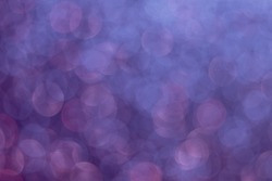 Bokeh light background. Defocused circles. Ultraviolet vapor. Blur neon blue color glowing round specks texture smoke cloud effect abstract overlay.