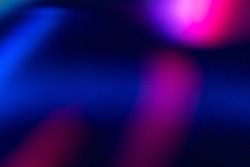 Blur color flare. Neon glow background. Bokeh radiance reflection. Defocused fluorescent blue pink light gleam on dark abstract overlay.