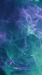 Color smoke texture. Ink water splash. North light. Neon glow purple green blue fog cloud floating abstract art empty space background.