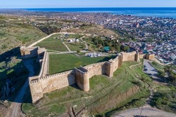 Old fortress Naryn-Kala in the urban landscape (top view). Derbent, Republic of Dagestan. Russia