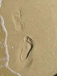 footprint on beach sand for wallpaper