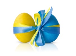 Easter eggs are blue, yellow tied with a bow. Flag of Ukraine. War in Ukraine