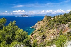 Picturesque landscape of the sea and island from the mountain road. Fethiye, Mugla province, Turkey.