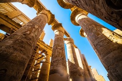 EGYPT - KARNAK TEMPLE - Travel tour group wanders through Karnak Temple. Beautiful Egyptian landmark with hieroglyphics, decayed temples, obelisks, towers, and other buildings. Luxor, Egypt