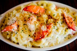 Lobster Mac n cheese. Macaroni noodles with lobster, cheese, bacon and Italian parsley. Classic American or Italian restaurant favorite. Homemade pasta with sauces, meats and cheeses.