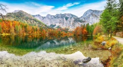 Spectacular autumn scene of Hinterer Langbathsee lake. Poppular travell destination. Location: Vorderer Langbathsee, Salzkammergut region, Upper Austria, Austria, Europe.