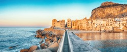 Outstanding evening cityscape of Cefalu city. Popular travel destination of Mediterranean sea. Location: Cefalu, Province of Palermo, Sicily, Italy, Europe