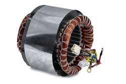 Stator of a power generator with a copper winding.