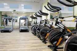 Fitness hall with the sport bikes in it 