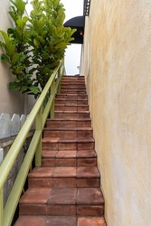 Ascending outdoor tile staircase in California