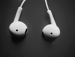 Image of White earphones in Monotone colour.Technology Gadgets Wallpapers for Desktop Pc Download 