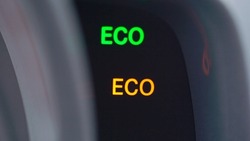 ECO pictogram sign at car dashboard. Ecological drive mode in automobile turn on and off. Green and yellow active system, gasoline and diesel economy. Electric vehicle, alternative fuel, hybrid auto.