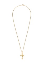 Close-up shot of a gold necklace featuring a cross pendant. The cross is with detailed edge. The fashion necklace features a lobster clasp. The necklace is isolated on a white background. Front view.