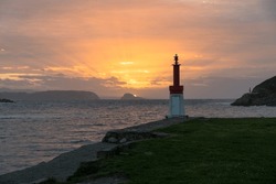 coastal lighthouse with a stunning sunset