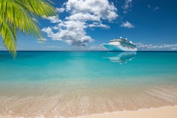 Luxury cruise ship at the beach of  tropical island.
