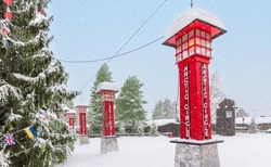 Snow in Santa Claus Village with the Arctic Circle in Rovaniemi, Lapland, Finland.	