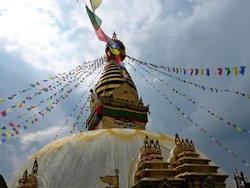 Buddhist holy stupa Swayambhunath in Kathmandu valley, Nepal.  Monkey Temple prayer flags on wind. Zen. Meditation. Nirvana.