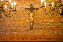 Crucifix on wall of old church. Catholic crucifix with text space. High quality photo