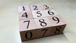 Children's blocks made of wood with numbers, for the development and teaching of the child numbers, addition and subtraction