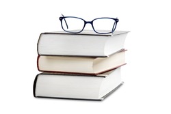 Book stack with eye glasses