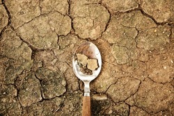 World Food Problem Concept. Environmental Impact. Food Shortage ,Global Issues in Agricultural Food Production. Cracked Soil, Desertification, Water, Pollution, Energy and Climate Change