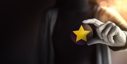 Success in Business or Personal Talent Concept. Young Employee Woman Holding a Golden Star