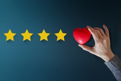 Customer Experience Concept, Best Excellent Services Rating for Satisfaction present by Hand of Happy Client put a Heart on Five Star