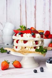 Delicate Pavlova cake with berries