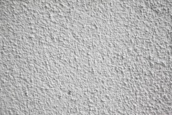 White and gray colored wall texture with rough surface, two color rough wall plaster