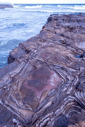 Unusual rock formations at Bulli Beach