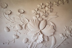 Flowers carved sandstone walls.