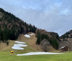 No snow on skiing slopes in winter due to climate change. . High quality photo
