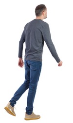 Side view of going handsome man. walking young guy . Rear view people collection. backside view of person. Isolated over white background.