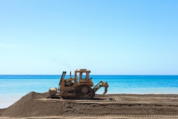 Excavate works near the sea on the coast