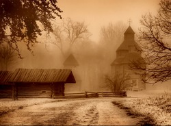 The road to the church and old house. Art photo in sepia.