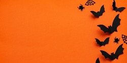 Orange happy halloween banner. Happy Halloween Background vector illustration. Halloween hanging ornaments on orange background.