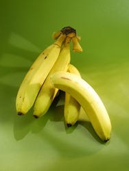 A bunch of bananas on a table, delicious, natural. Raw Organic Bunch of Bananas Ready to Eat. selective focus
