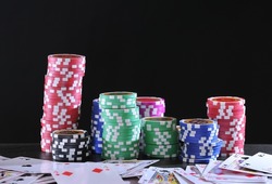 Poker chips isolated on a black background.