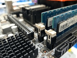 Electric components on a motherboard circuit panel.