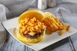 Mac and Cheese burger with French fries 