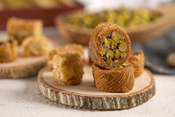Arabic Sweets or Desserts arabic baklava
Middle East and Arabic desserts, Ramadan sweets (konafa and Baklava) decorated in a gift box
