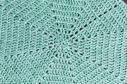 handmade octogon multicolor crochet background in green and white with double crochet stitches