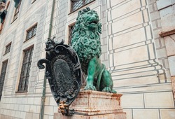 Statue of Lion. Beautiful landmark in the city of Munich, in Germany. Tourist attraction.