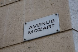 avenue mozart , typical street name plate sign of Paris