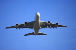 A380 jet aircraft flying low overhead