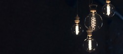 Vintage style round light bulbs hanging from the ceiling