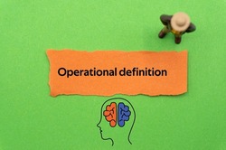 Operational definition.The word is written on a slip of colored paper. Psychological terms, psychologic words, Spiritual terminology. psychiatric research. Mental Health Buzzwords.
